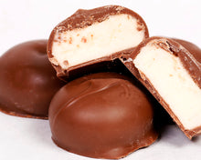 Load image into Gallery viewer, close-up shot of our famous milk chocolate peppermint creams