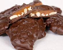 Load image into Gallery viewer, A close-up shot of our milk chocolate turtles