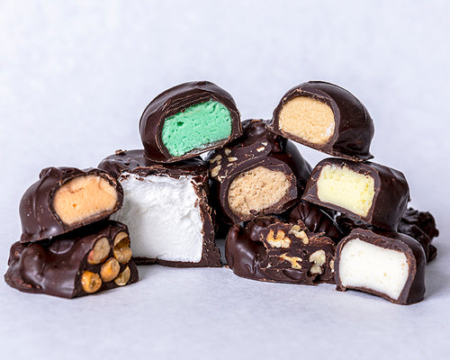 close-up shot an assortment of dark chocolate candies