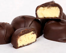 Load image into Gallery viewer, A close-up shot of our famous dark chocolate lemon creams
