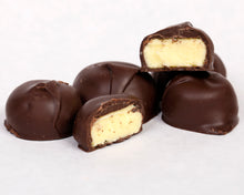 Load image into Gallery viewer, A close-up shot of our famous dark chocolate lemon creams
