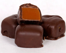 Load image into Gallery viewer, A close-up shot of our delicious milk chocolate covered caramels
