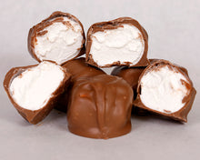 Load image into Gallery viewer, A close-up shot of our famous milk chocolate covered marshmallows
