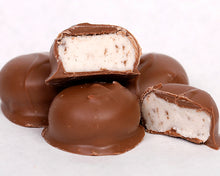 Load image into Gallery viewer, A close-up shot of our famous milk chocolate maple creams
