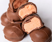 Load image into Gallery viewer, close-up shot of our famous milk chocolate orange creams
