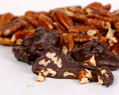 A close-up shot of our dark chocolate covered pecan clusters